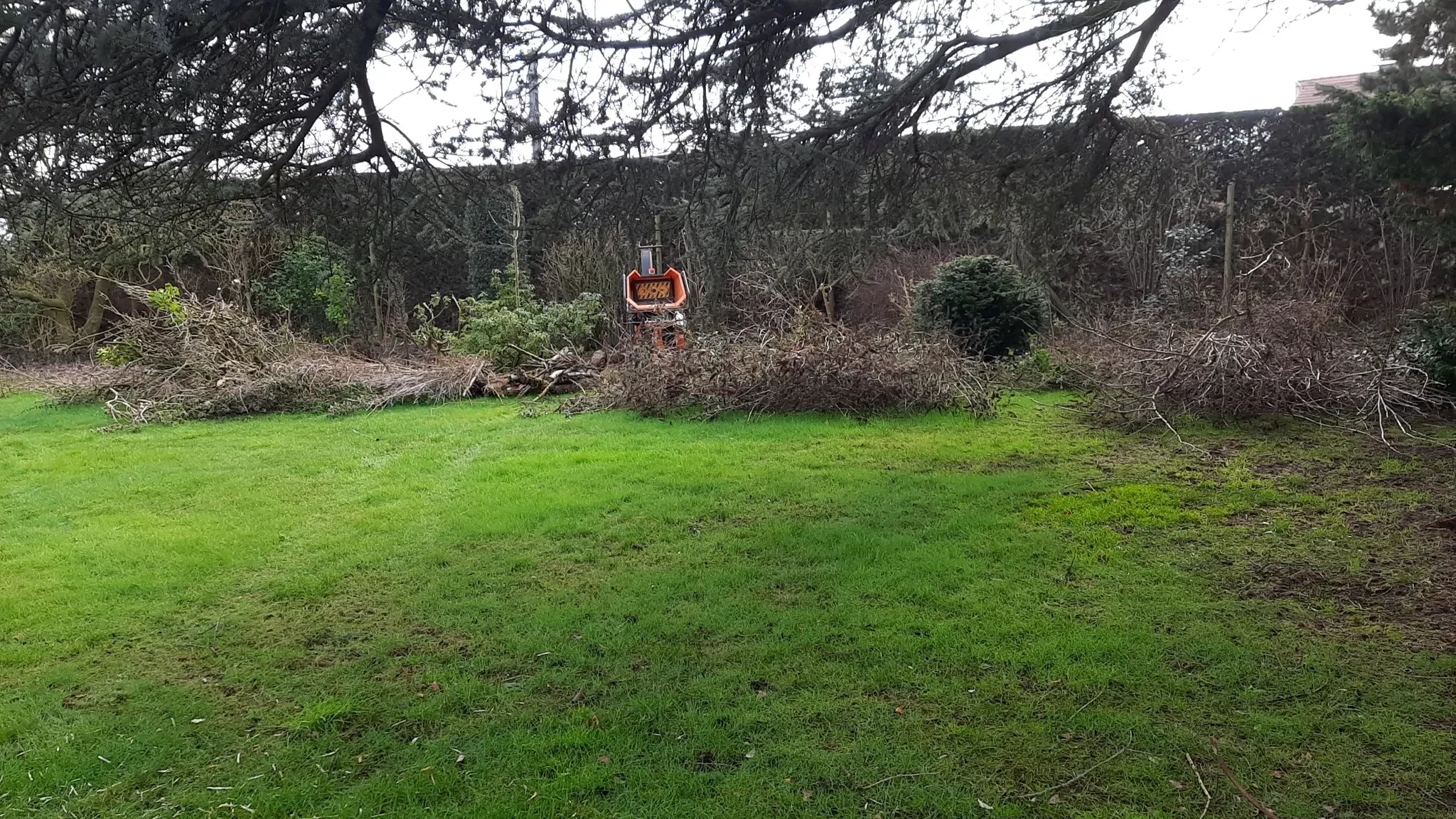 Een nette tuin, ook met een composthoop erbij